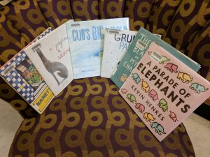 Picture books face-out on a chair