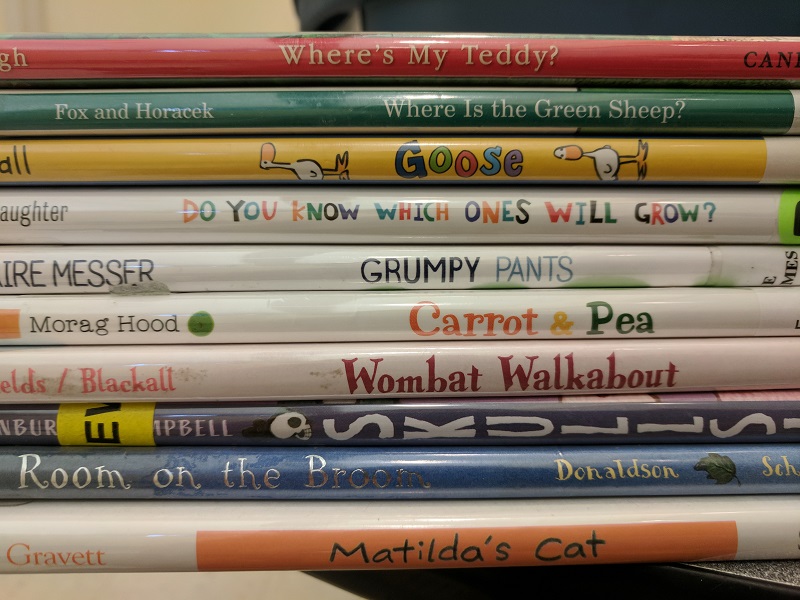 Stack of picture books, spines showing