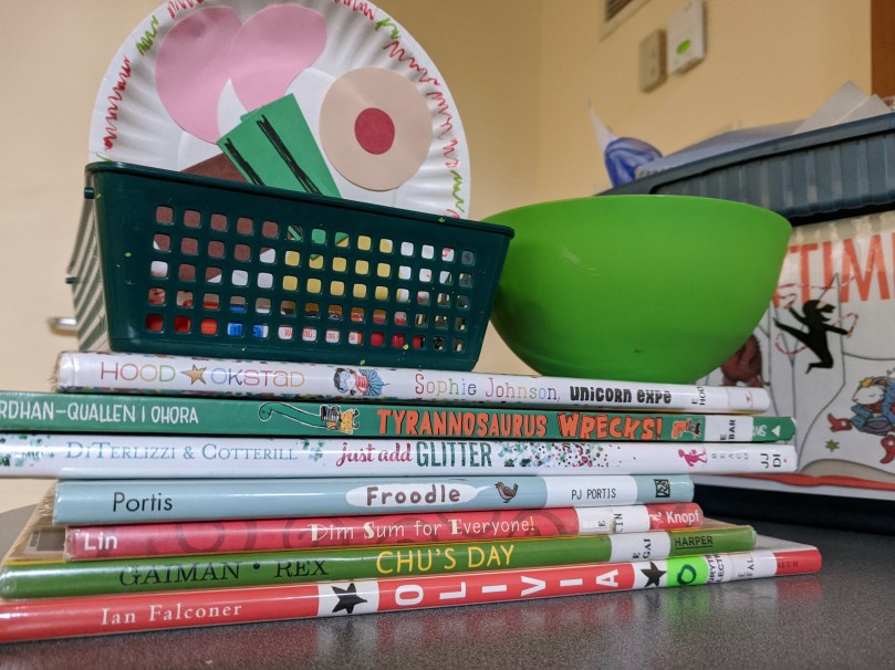 Craft materials on top of picture books