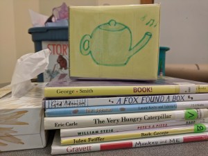 song cube, books, tissue box