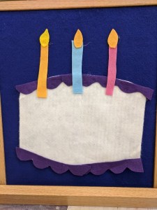 felt birthday cake and three candles