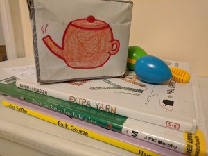 Song cube, books, shaker egg and maraca