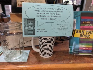 Mug with censored text, sign, glass jar, copy of Ban This Book